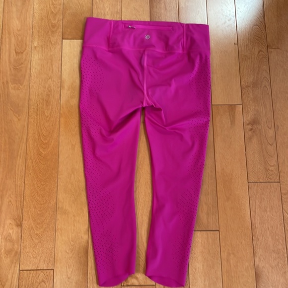 Athleta capri leggings; XS Petite; decorative hole embellishments; raspberry - Picture 4 of 6